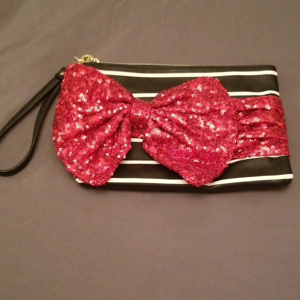 Bestey Johnson Sequence Bow Wristlet